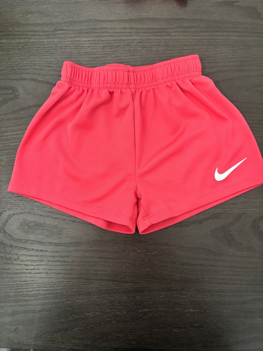 Nike Coral Pink Girls' Mesh Running Shorts with White Swoosh